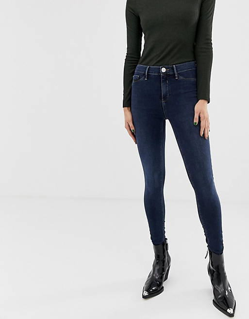 River Island – Molly – Enge Jeans in dunkler Waschung