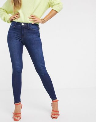 River Island – Molly – Jeans in dunkler Waschung-Blau