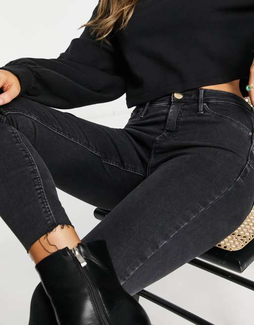 River Island Molly mid rise bum sculpt skinny jeans in black, 4 of 4