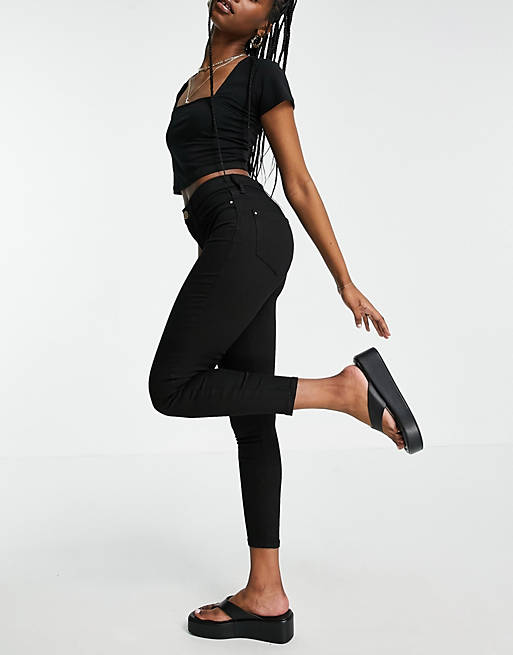 River Island Molly mid rise reform skinny jeans in black
