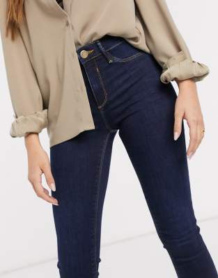 dark blue mid rise skinny jeans