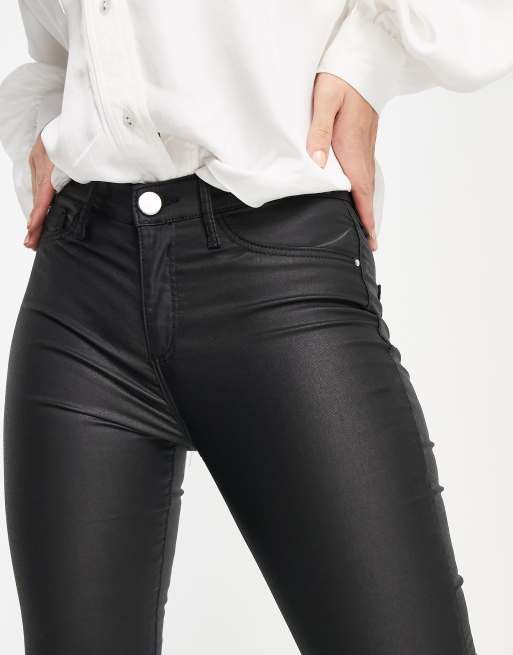 River Island Molly mid rise waxed coated skinny jeans in black