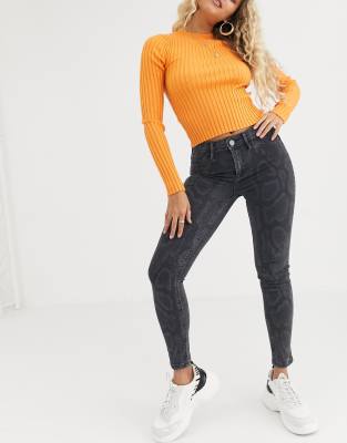 snake print skinny jeans