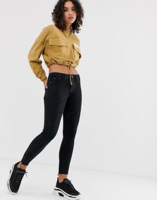 raw hem black skinny jeans