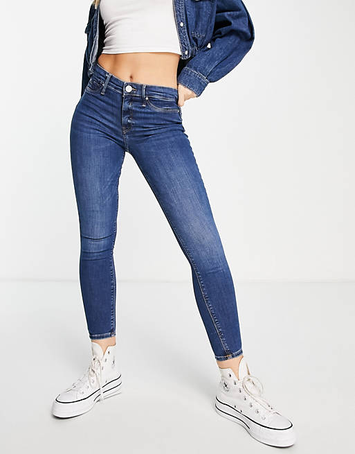 River Island - Molly - Vormgevende skinny jeans met halfhoge taille in donkerblauw