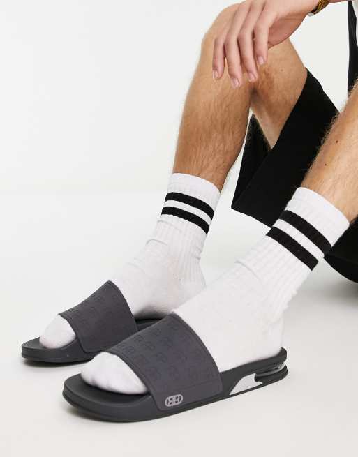 River Island monogram bubble slides in gray