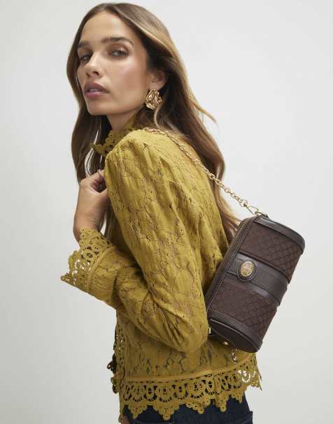 River Island Monogram jacquard mini barrel bag in dark brown - view 1