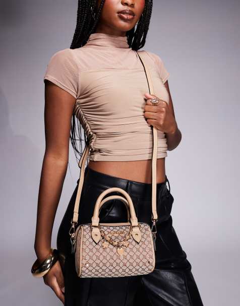 River Island monogram mini bowler bag in brown - view 1