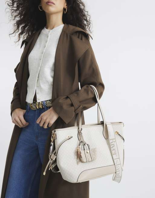 River Island Monogram side tie charm shopper bag in beige - light
