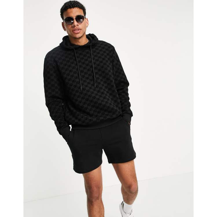 River Island monogrammed hoodie in black