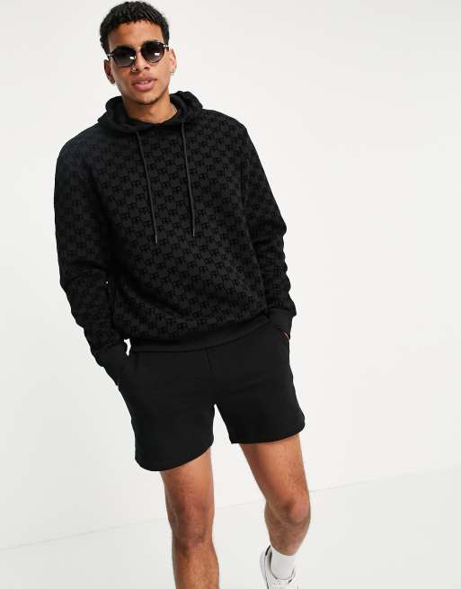 River Island monogrammed hoodie in black