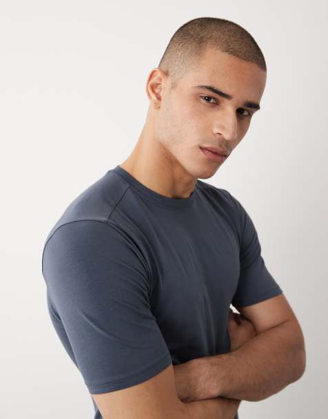 River Island – Mörkblå t-shirt i muscle fit - view 1