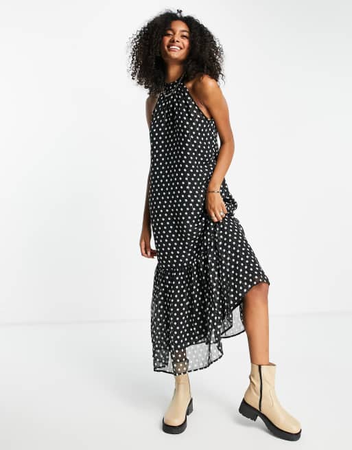 River Island - Mouwloze midi-jurk met halternek en stippen in zwart