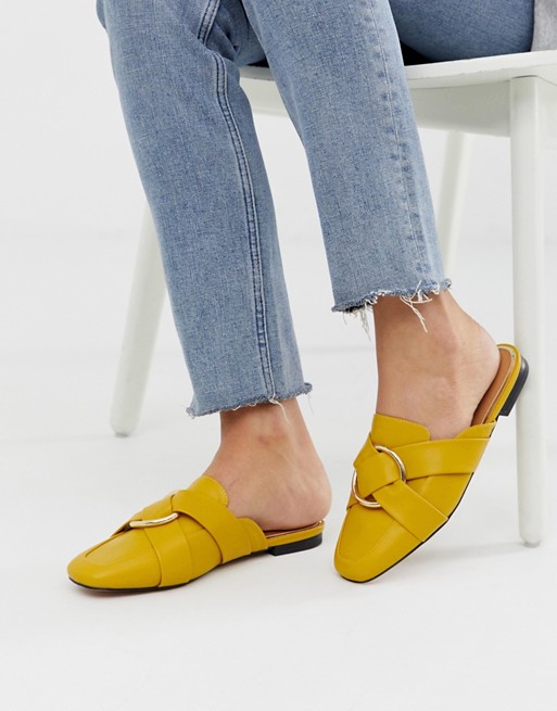 River Island mule loafers with circle detail in yellow