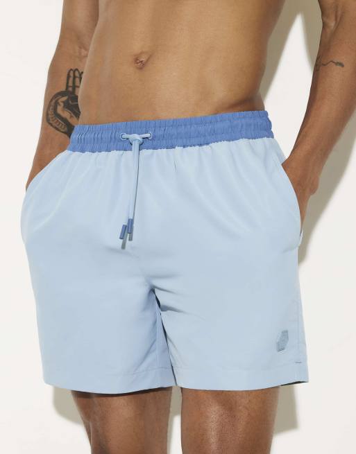 River Island Multipack of 2 swim shorts in multi colour, 2 of 4