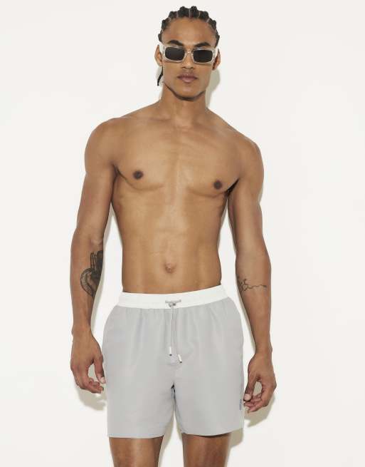 River Island Multipack of 2 swim shorts in multi colour, 3 of 4
