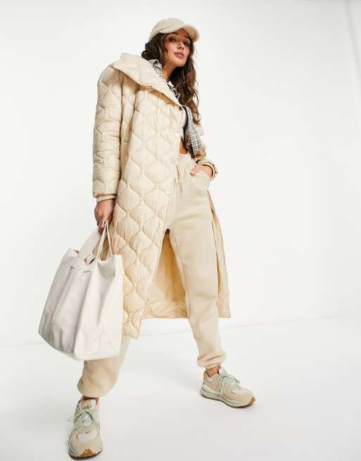 River Island onion quilt padded coat in light yellow | ASOS