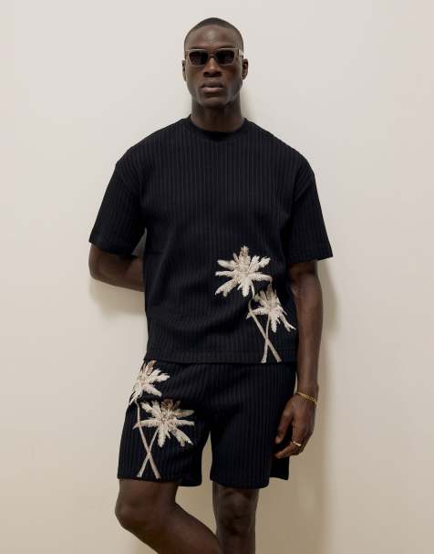 River Island Oversized plisse palm tee t-shirt in black - view 1