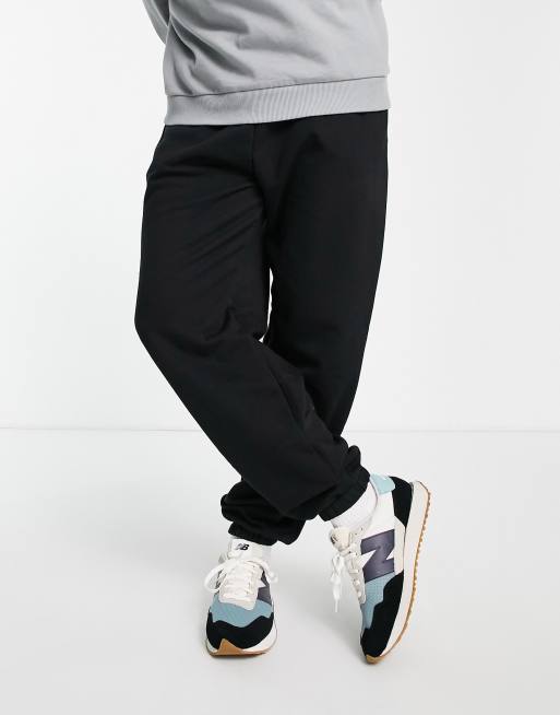 River Island oversized trackies in black | ASOS