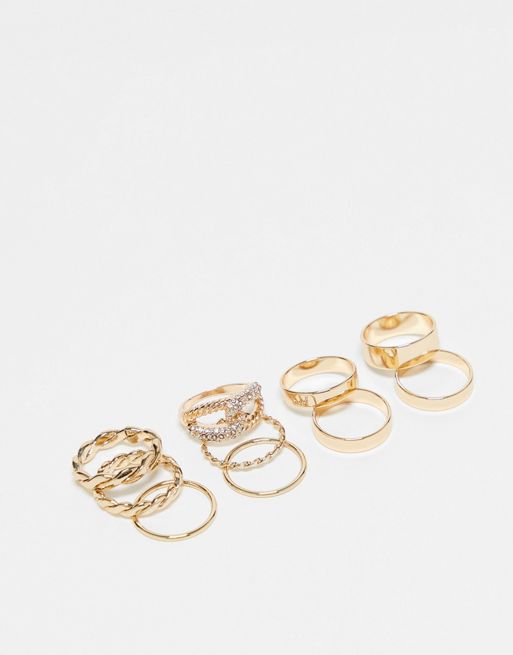 River Island pack of 10 rings in twist and crystal designs in gold tone ...