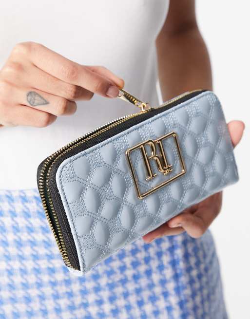 River Island padded monogram zip wallet in blue