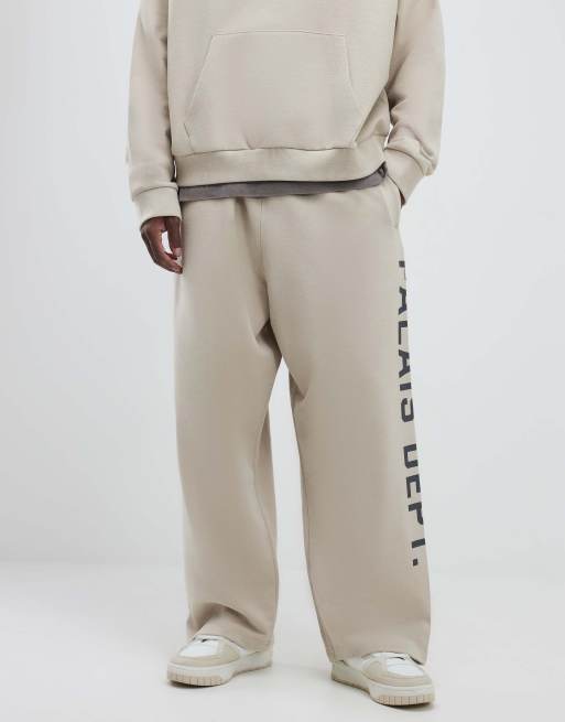 River Island 'Palais' graphic wide leg trackies in ecru , 2 of 4
