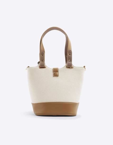 River Island Panelled bucket bag in beige - view 1