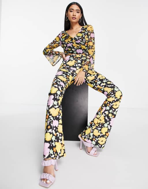 River Island - Pantalon évasé d'ensemble en tulle froncé avec devant en V et imprimé floral - Jaune