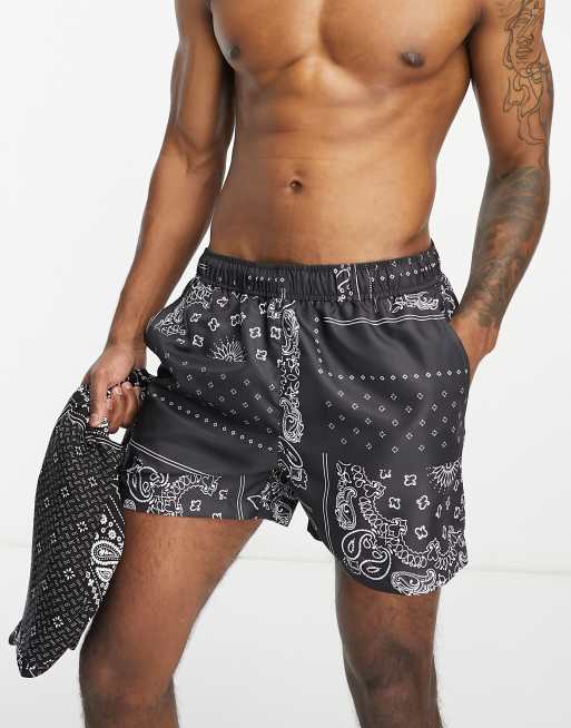 River Island - Pantaloncini da bagno con stampa cachemire neri in coordinato 