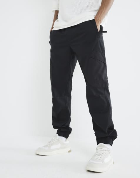 River Island - Pantaloni cargo neri con fondo elasticizzato - view 1