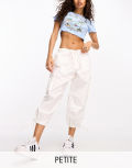 River Island Petite baggy low rise parachute pants in white