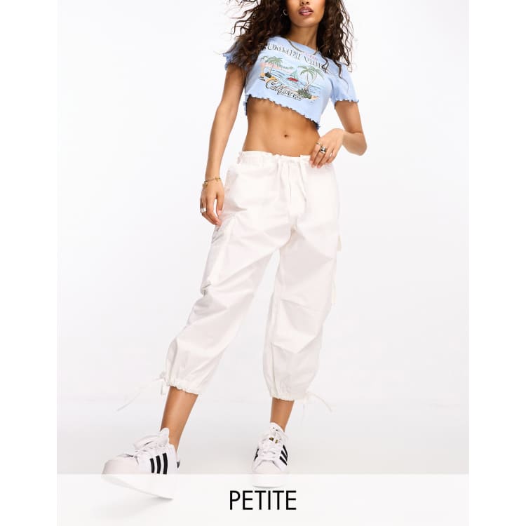 River Island Petite baggy low rise parachute trousers in white