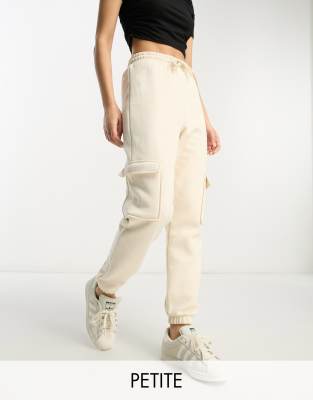 Bershka Petite pocket detail slim leg cargo pants in light beige