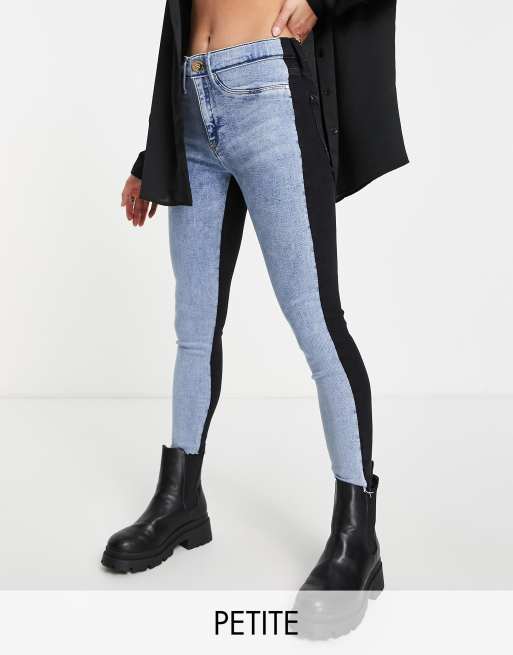 River Island Petite color block mid rise skinny jeans in black and blue