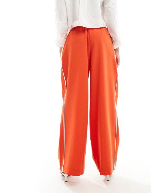 River Island petite contrast side stripe trouser in red ASOS