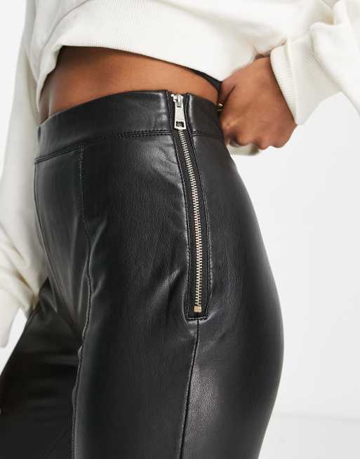 River Island Petite faux leather zip detail pants in black