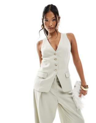 fitted longline vest in light green