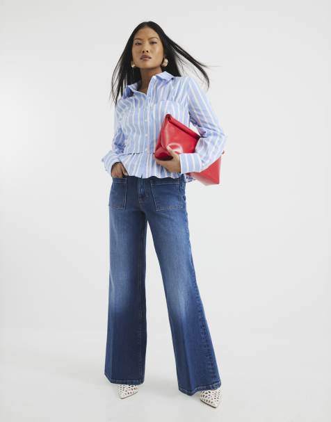 River Island Petite high rise relaxed flare jeans in denim - view 1