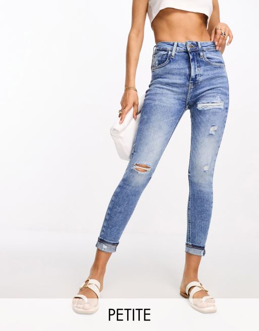 River Island Petite high rise sculpt skinny jeans with ripped knees in mid blue wash