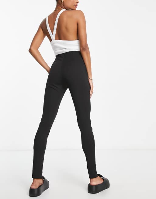 River Island Petite – Leggings in Schwarz mit Saumschlitz