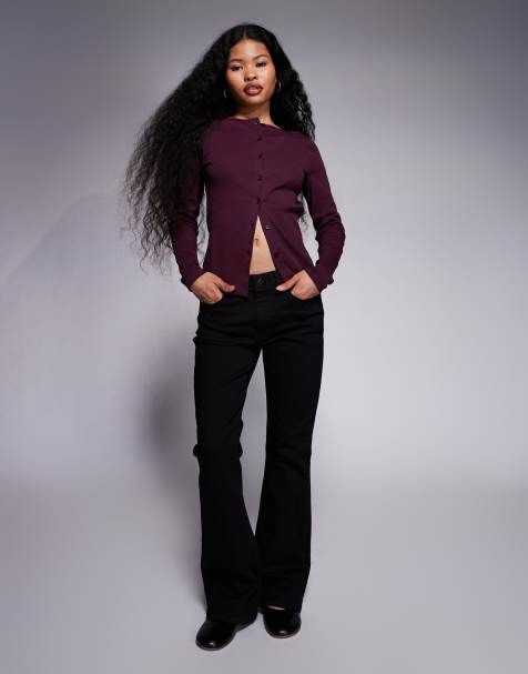 River Island petite mid rise bootcut flared jeans in black - view 1