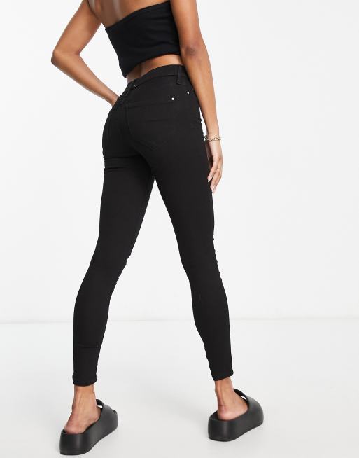 River Island Petite mid rise skinny jeans in black, 2 of 4