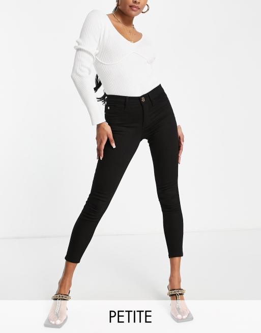 River Island Petite Molly mid rise skinny jeans in black | ASOS