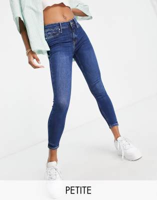 River Island Petite Molly mid rise skinny jeans in dark blue