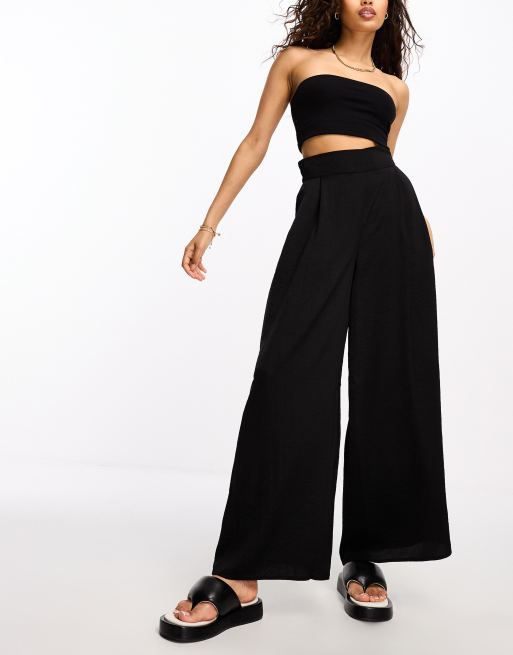 River Island Petite palazzo wide leg trousers in black