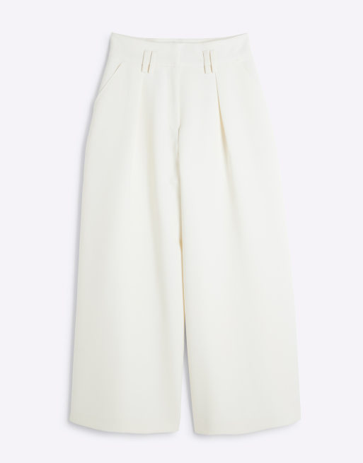 River Island Petite - Pantaloni a fondo ampio color crema a vita alta