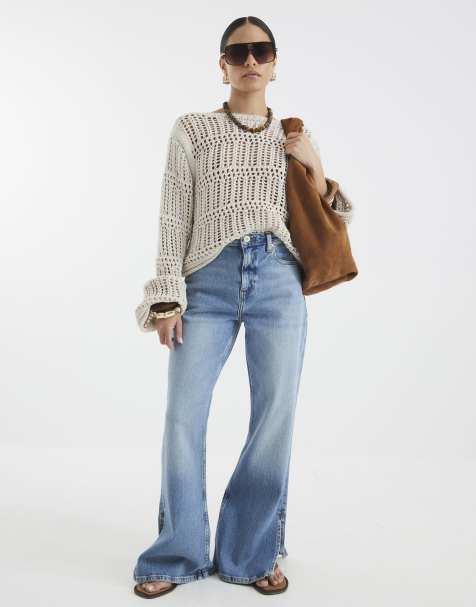 River Island Petite Petite high rise flared jeans in denim - medium - view 1