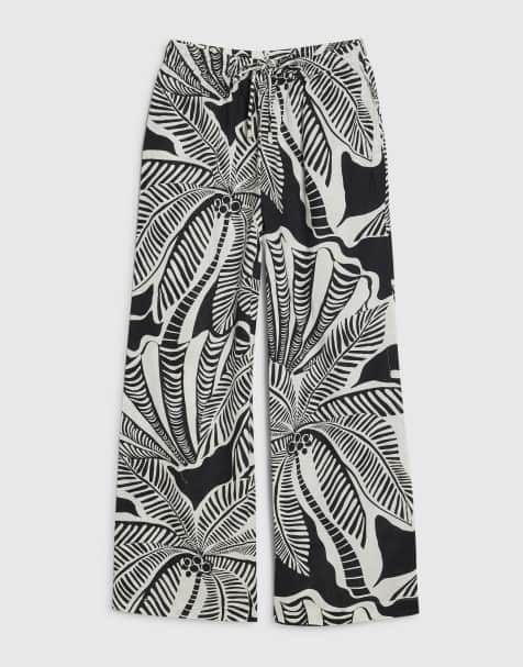 River Island Petite Petite linen blend printed trousers in black