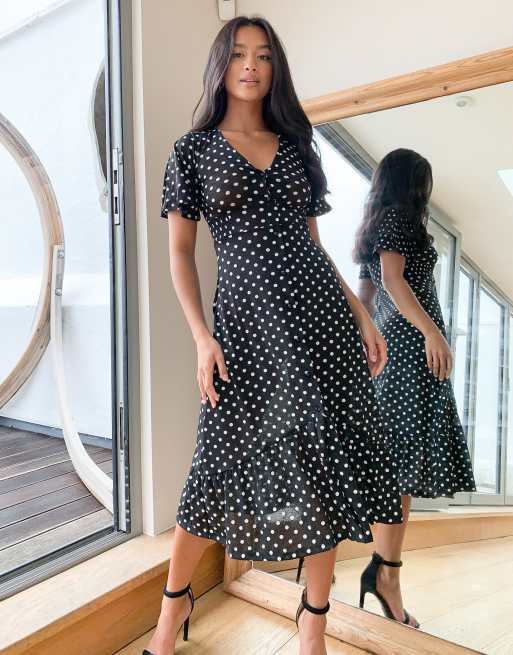 Black poke shop a dot dress