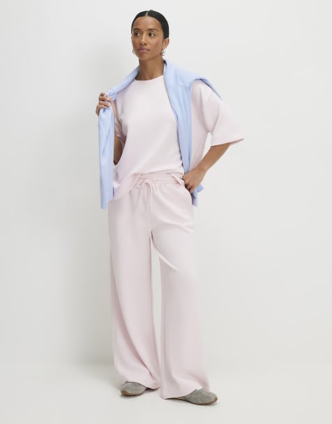 River Island Petite Premium wide leg joggers in pink - view 1